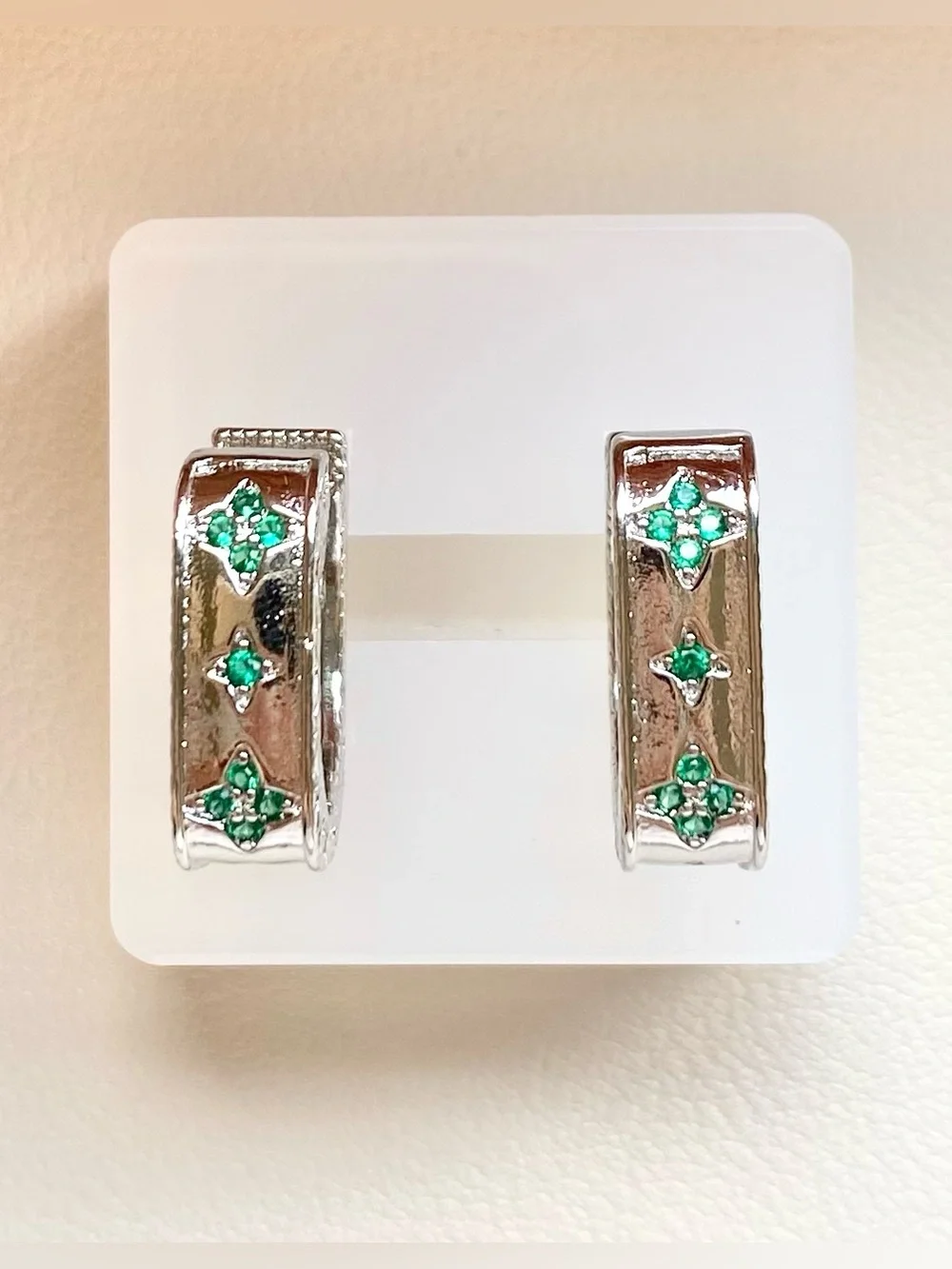Silver Hoop Earrings with Green Gem Accents